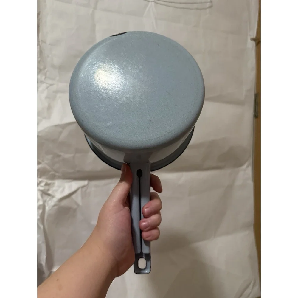 vintage light blue enamelware saucepan